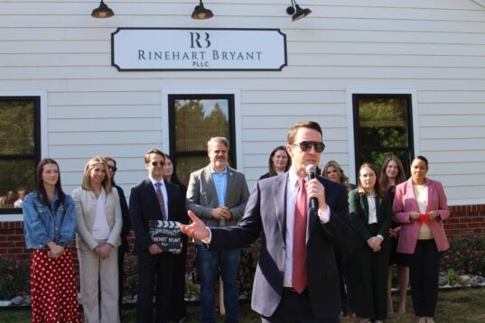 Founding attorney John Bryant speaking in front of the Rinehart Bryant Spotsylvania family law office.